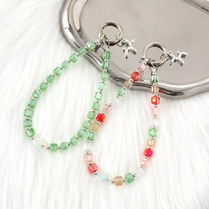 Crystal beaded phone charm with metallic balloon dog pendant and silver round clasp