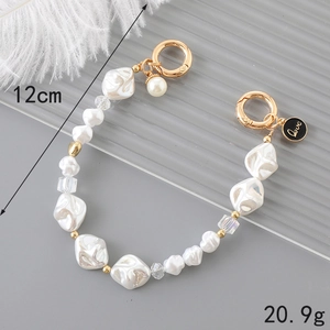 Baroque pearl phone strap with golden spring clasps and love charm accessory
