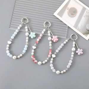 Handmade beaded bag charm with pearls resin heart and cherry blossom pendant in three colors