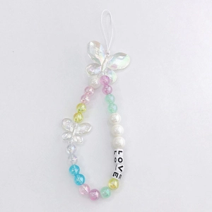 Close-up of colorful macaron beads and LOVE letter charms on a phone wrist strap