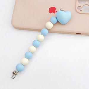 Pastel blue and beige acrylic heart-beaded phone strap charm with silver metal clasps