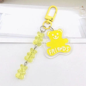 Porte-clés ours jaune en acrylique avec texte Friends et trois petits oursons