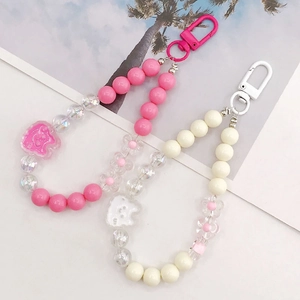 Handmade beaded rabbit and bear charm straps in pink and cream for DIY mobile cases
