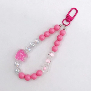 Pink beaded rabbit phone strap with acrylic bear charm and transparent flower pendant