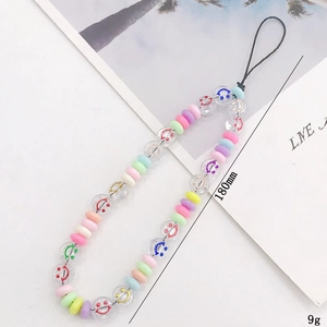Handmade beaded phone strap with colorful smiley acrylic beads and macaron accents