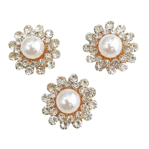 Three-piece set of gold floral charms with faux pearls and rhinestones for DIY crafts