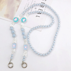 Close-up of light blue beaded phone strap with silver butterfly charms and heart accents