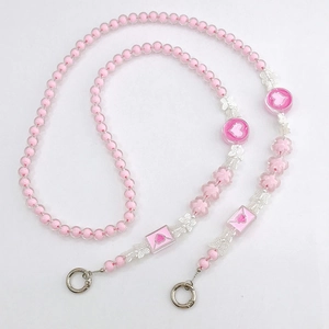 Pink beaded phone charm with acrylic hearts and silver butterfly pendant detail
