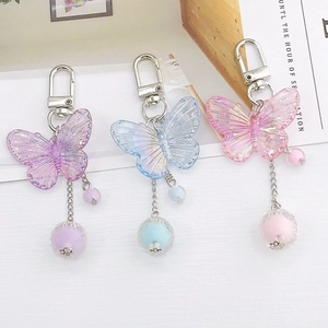 Portachiavi a farfalla in resina glitterata rosa blu e viola con catena argento