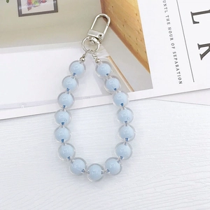 Detail view of light blue double-layered acrylic beaded keychain with silver lobster clasp