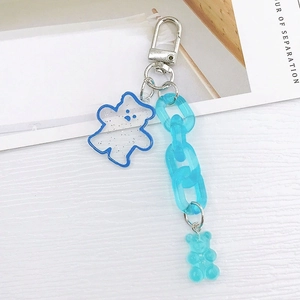 Cute blue acrylic gummy bear keychain with silver metal clasp and plastic chain link