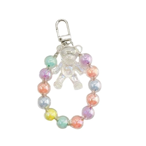 Colorful resin bear keychain with iridescent beads and silver lobster clasp on white background