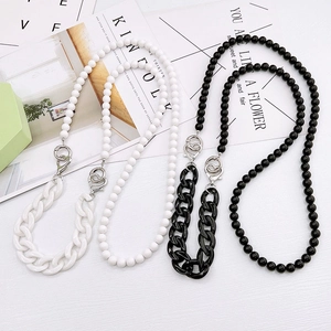 Acrylic beaded crossbody phone strap with resin links in pearl white and obsidian black