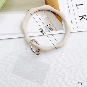 Cream silicone wave phone wrist strap with metal spring ring and transparent tether tab