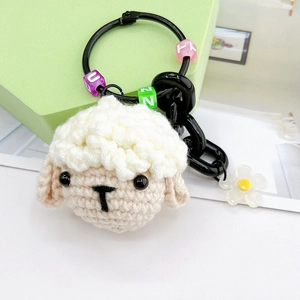 Porte-clés mouton au crochet fait main avec perles colorées et pendentif fleur blanche