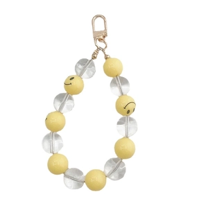 Beaded keychain with yellow smiley face beads and transparent round charms for phones