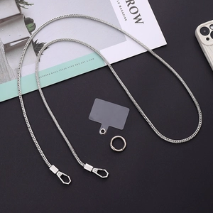 Detail of silver snake chain crossbody phone strap with metal clasps and clear patch