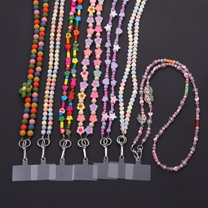 Candy-colored acrylic beaded phone lanyards with floral charms and metal spring clasps