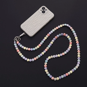 Detail of colorful acrylic heart-shaped beads on a lanyard with a metal clasp