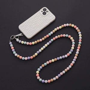 Detail of candy-colored acrylic beaded phone lanyard with wavy white phone case