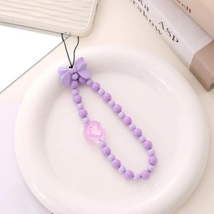Creative purple acrylic beaded phone strap with a butterfly bow for stylish wrist protection