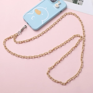 Detail of candy-colored acrylic chain link phone strap with cute duck cartoon case