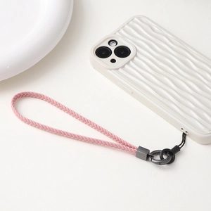 Close-up of pink woven leather phone strap with durable dark grey metal connector hook