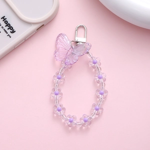 Purple beaded flower keychain with a laser butterfly charm for phone cases