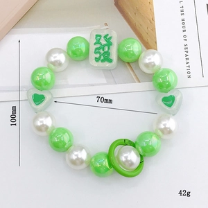 Bracelet perlé avec breloque mah-jong et perles vertes pour téléphone ou clés