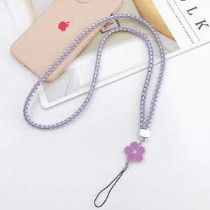 Detail of purple braided phone lanyard with elegant floral charm and silver metal accents