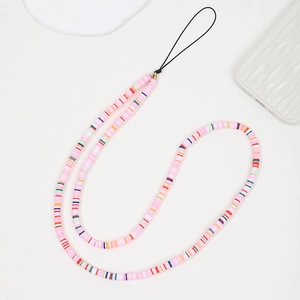 Lanière de téléphone en perles d'argile polymère rose avec accents dorés et colorés