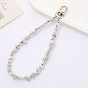 Fashionable beaded phone charm featuring white marble stone and silver metal beads