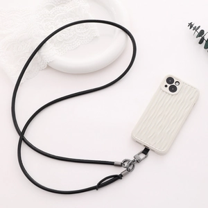 Detail of a white wavy texture phone case with a black leather crossbody strap and metal clasp