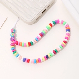 Colorful macaron bead phone strap with floral charms on a white wavy phone case
