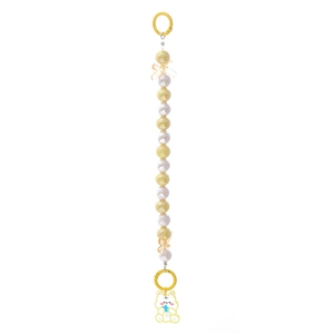 Iridescent beaded bear strap with yellow bows and rabbit charm on white backdrop