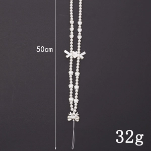 50cm white pearl bow phone lanyard strap with acrylic heart beads weighing 32g
