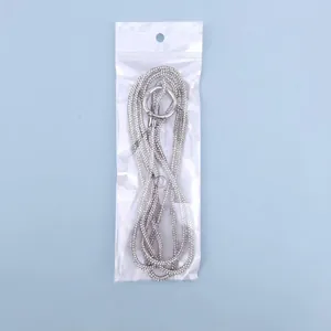 Luxurious silver rhinestone crossbody phone chain with metal ring clasp in packaging