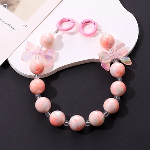 Pink marble bead phone charm chain with iridescent bows and round spring buckle strap