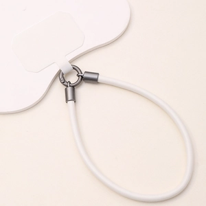 Close-up of white leather wrist strap with dark grey metal buckle and case connector