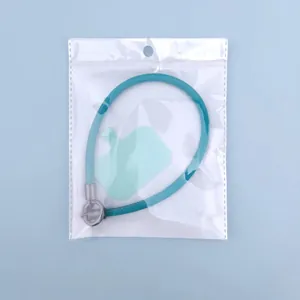 Teal blue leather phone wrist strap with silver metal clasp in retail packaging