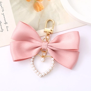 Pink satin bow keychain with golden heart pendant and pearls for bags and phones