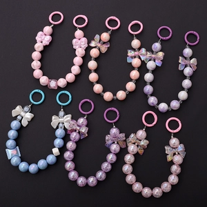 Pastel mermaid beads phone charms collection with colorful resin pearls and ribbon bows