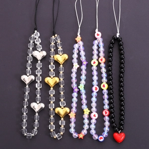 Five assorted heart and star beaded phone charms in metallic and colorful acrylic styles