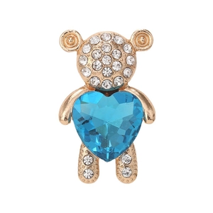 Charm a orsetto con cristallo a cuore blu e strass bianchi su base in lega dorata