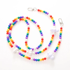 Detailed view of rainbow beaded phone strap with white 3D cloud charms and metal hooks