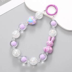 Beaded phone charm with purple rabbit pendant and heart bead on a circular plastic ring