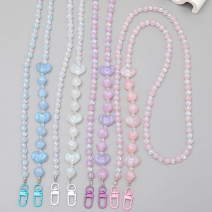 Cordon de téléphone perlé lumineux nuit étoilée et bijou de sac avec cœurs aux tons pastels