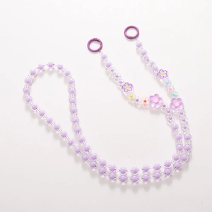 Purple beaded crossbody phone lanyard with translucent flower charms and spring rings