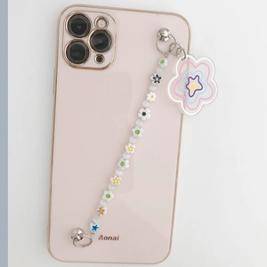 Pastel beaded phone strap with macaron flower charms and clear acrylic floral pendant
