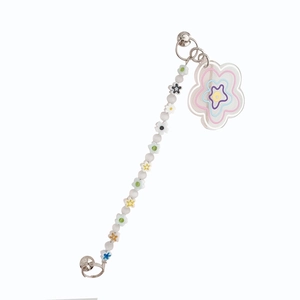Floral beaded charm with white petals and a colorful acrylic flower pendant for phone cases